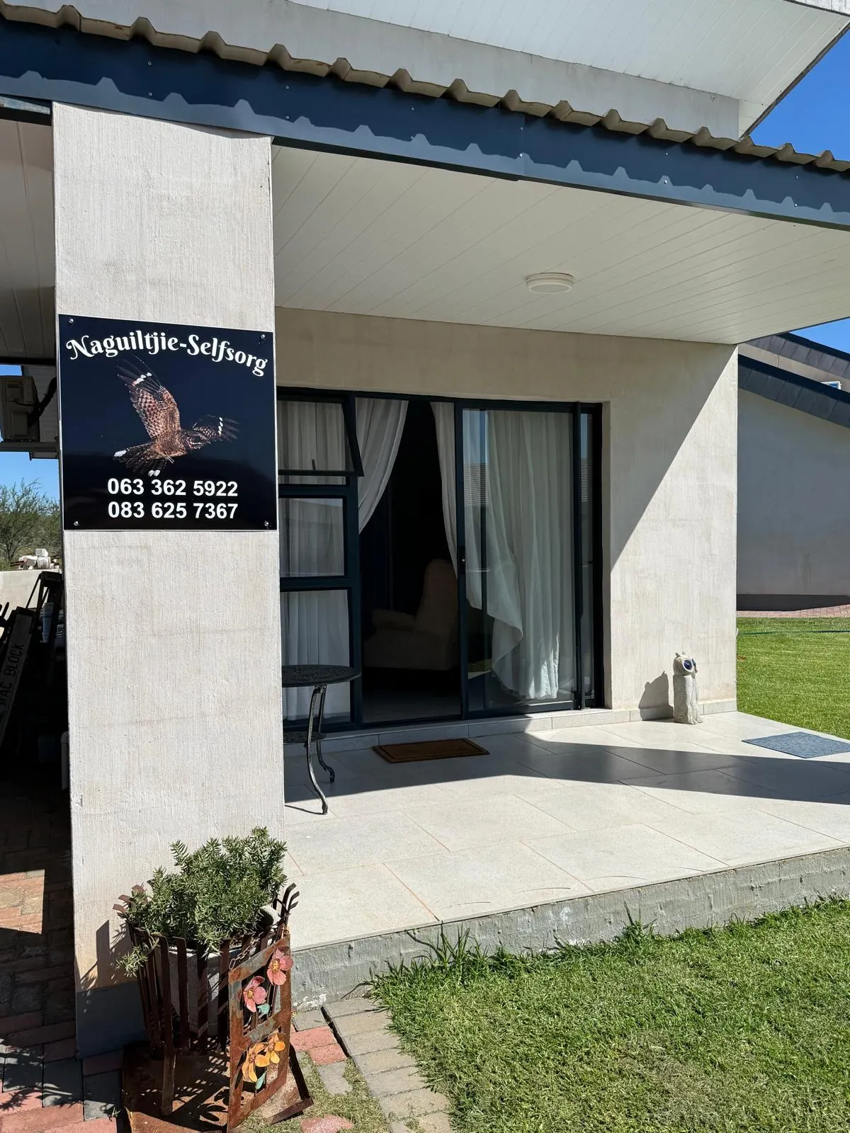 Naguiltjie Selfsorg-bordjie by die ingang